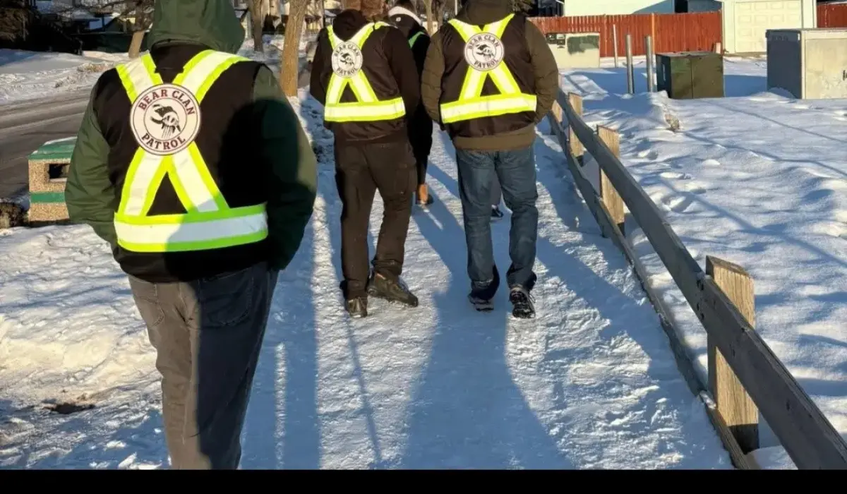 Bear Clan Patrol members walking in Winnipeg after losing charity status, supporting community safety