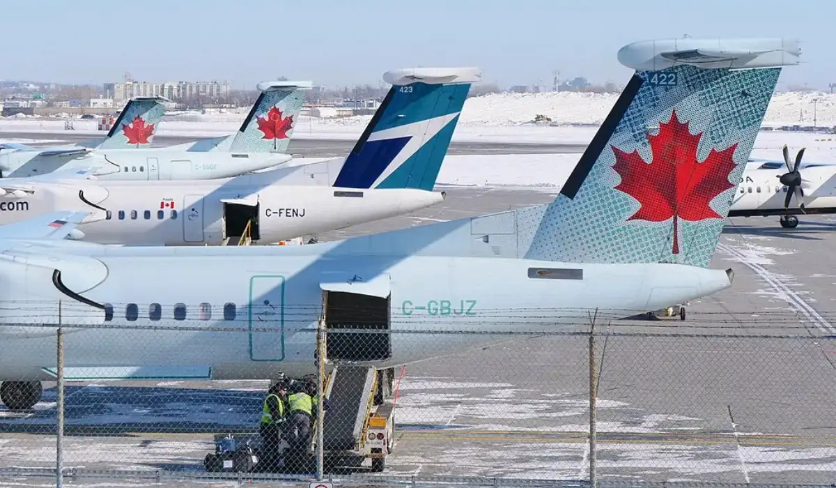 Passengers at airport as Air Canada, WestJet and Porter increase fuel surcharges causing higher flight prices in Canada