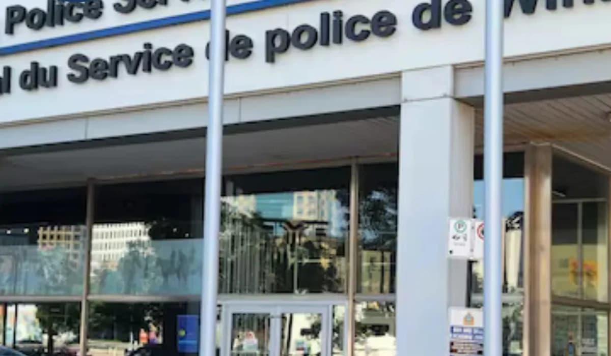 Winnipeg rooftop HVAC metal theft investigation scene with police