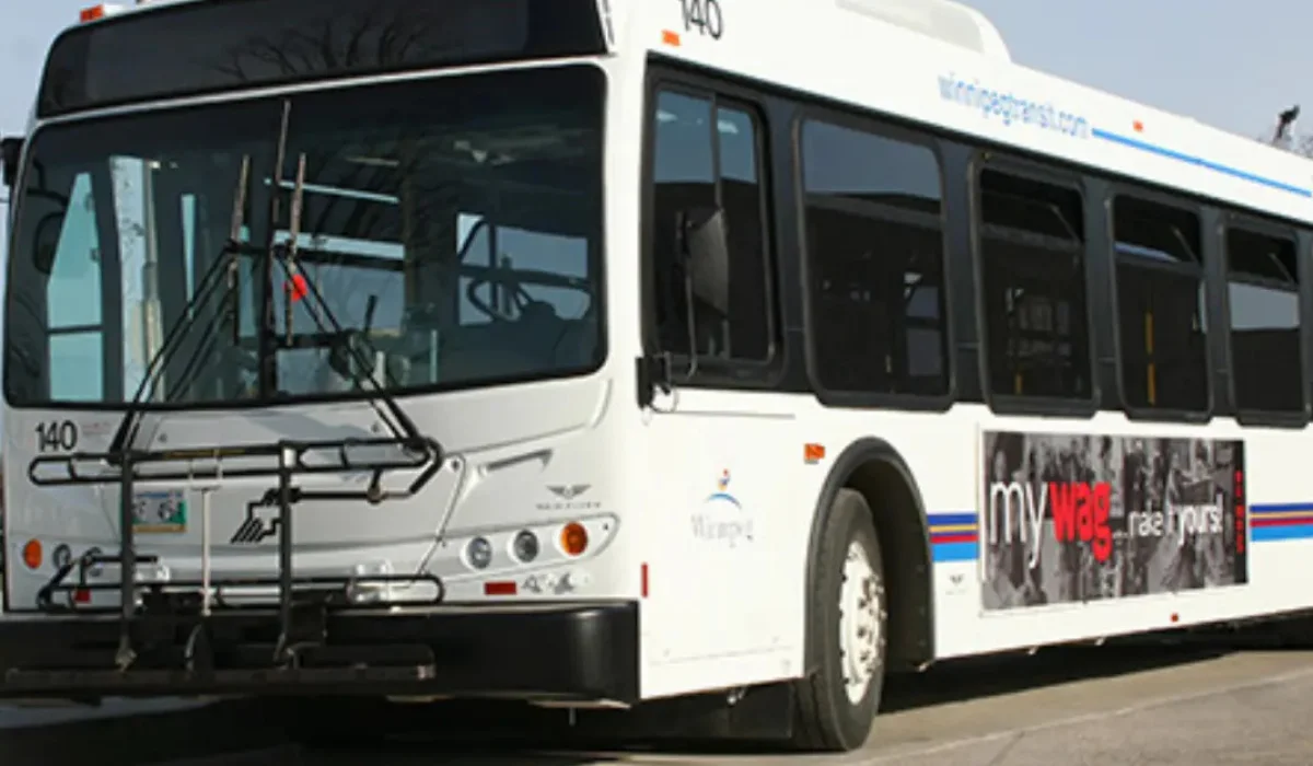 Winnipeg Transit bus running on city road with updated spring 2026 schedule changes