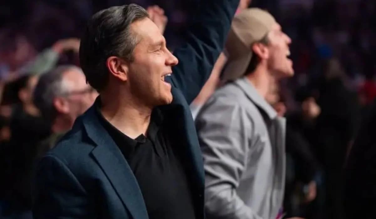 Pierre Poilievre attending UFC Fight Night in Winnipeg as crowd watches the event inside the arena